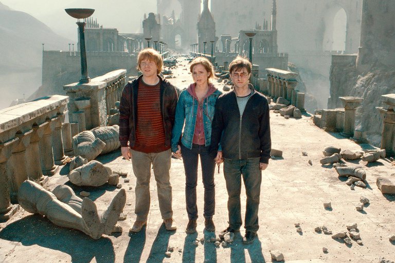 Harry Potter and the Deathly Hallows: Part 2 Rupert Grint as Ron Weasley, Emma Watson as Hermione Granger, and Daniel Radcliffe as Harry Potter