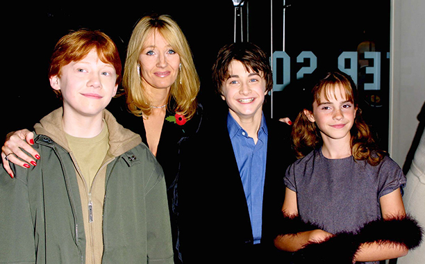 LONDON - NOVEMBER 4: (L to R) Rupert Grint (Ron Weasley), author J.K. Rowling, Daniel Radcliffe (Harry Potter) and Emma Watson (Hermione Granger) attend the world film premiere of "Harry Potter and The Philosopher's Stone" at the Odeon Leicester Square cinema in London on November 4, 2001. The film is titled "Harry Potter and The Sorcerer's Stone" for it's U.S. release. (Photo by Gareth Davies/Getty Images)