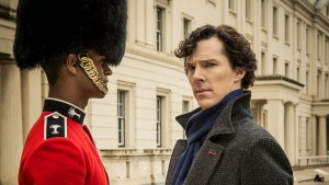Benedict Cumberbatch as Sherlock Holmes with Alfie Enoch as Bainbridge, the bloody guardsman in BBC Sherlock Season 1 Episode 2 The Sign o