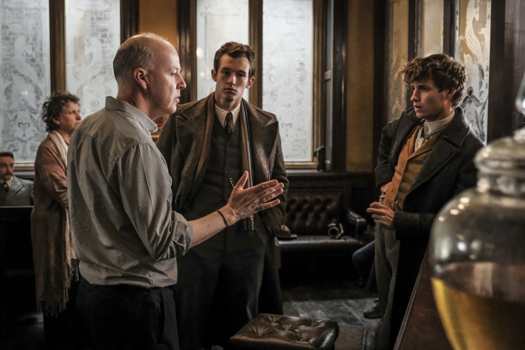 Photo by Jaap Buitendijk, warner bros behind the scenes image exclusive david yates, eddie redmayne and callum turner on fantastic beasts: the crimes of grindelwald set