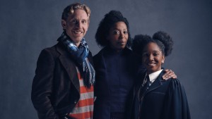 This is a family portrait of Ron (Paul Thornley), Hermione (Noma Dumezweni), and Rose (Cherelle Skeete).