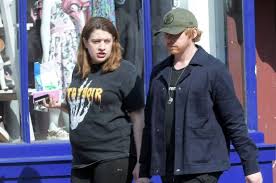 Rupert Grint, pictured with girlfriend Georgia Groome in April 2020.