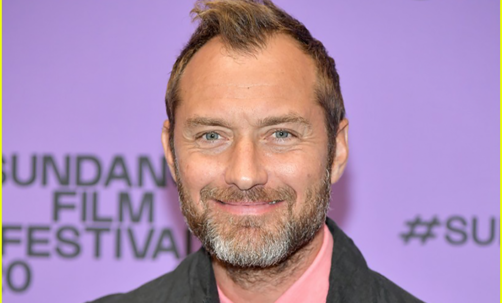jude law just jared beard smiling